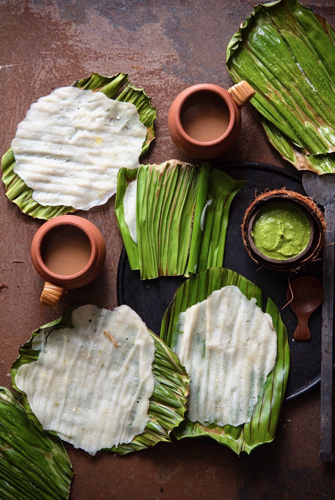 Panki Delicate Rice Flour Crepes Steamed In Banana Leaf Theroute2roots